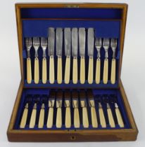 Boxed set of twelve bone handled and silver fish knives and forks, some of the handles are