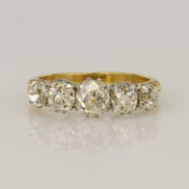 18ct yellow gold antique diamond dress ring, five graduating old mine cuts principle approx. 0.95ct,