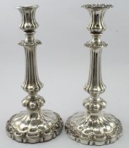 Pair of William IV silver candlesticks (missing one detachable sconce), the remaining sconce and