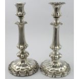 Pair of William IV silver candlesticks (missing one detachable sconce), the remaining sconce and