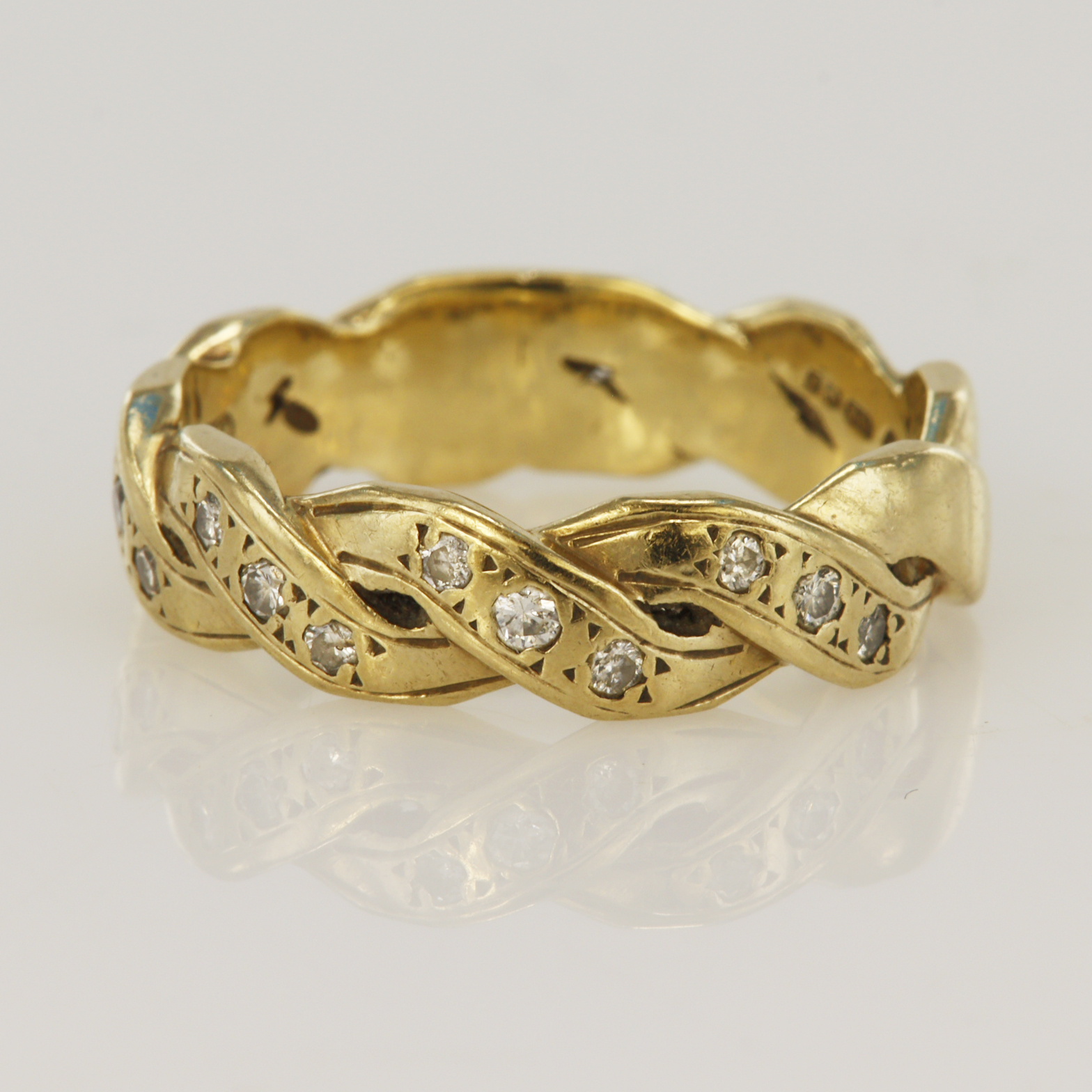 9ct yellow gold woven rope diamond ring, twelve round brilliant cuts TDW approx. 0.18ct, band