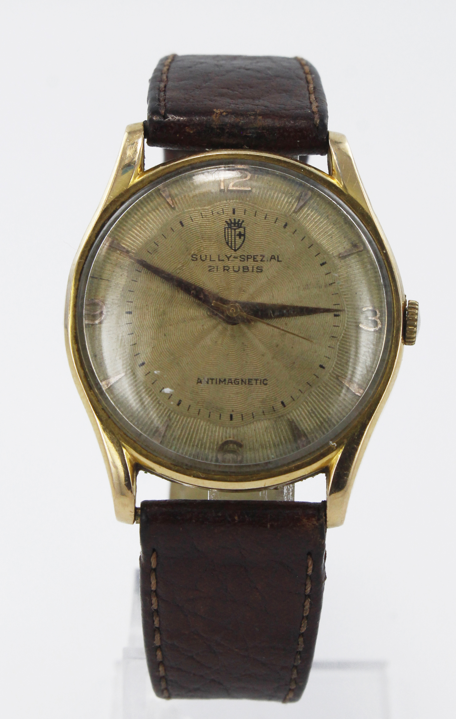 Gents 18ct cased 'Sully-Spezial' manual wind wristwatch. The guilloché dial with gilt Arabic