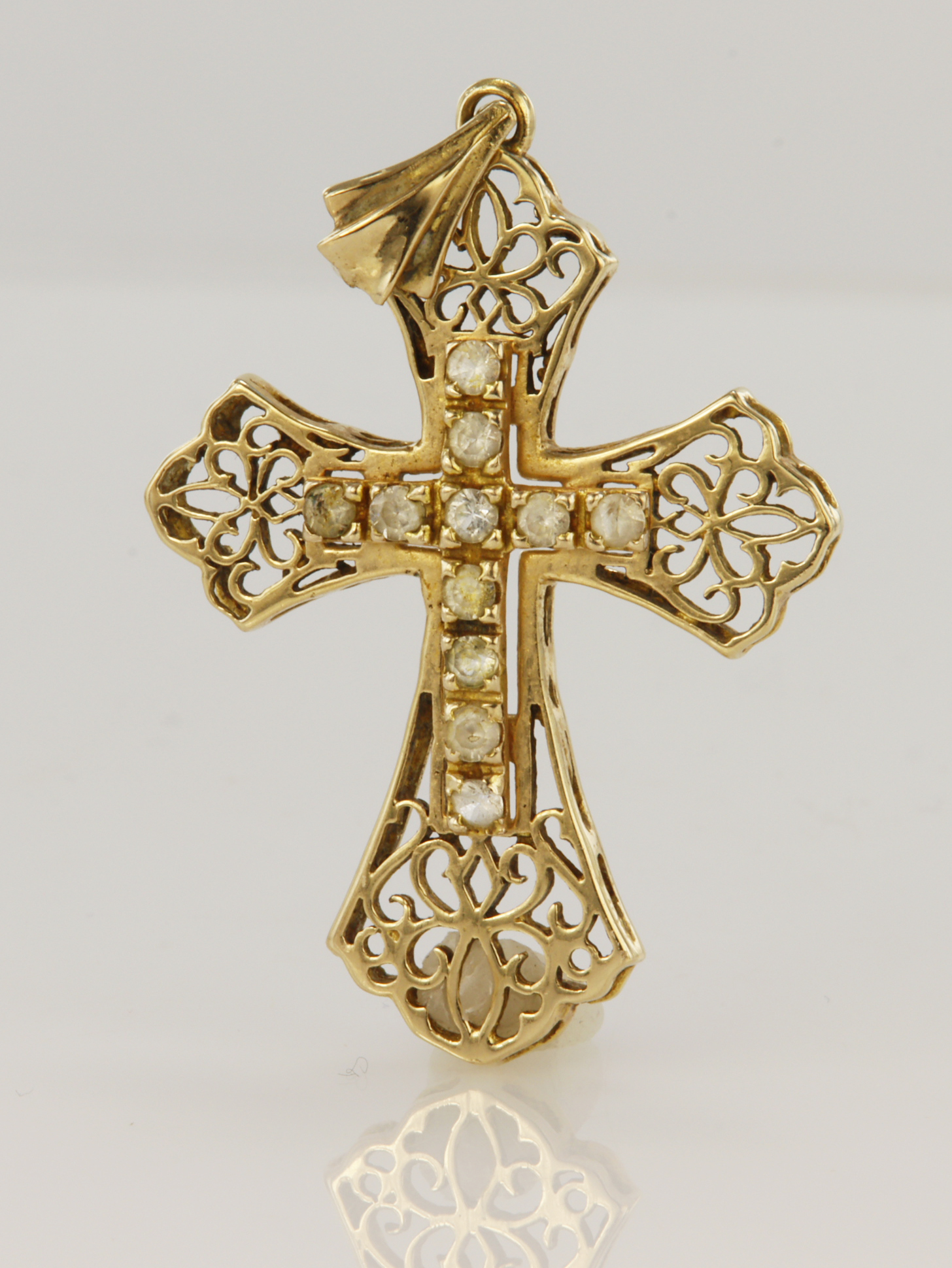 9ct yellow gold filigree fancy cross set with eleven round cz stones, cross measures approx. 5cm x