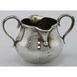 Unusual Victorian double lipped silver cream jug hallmarked EE (Elizabeth Eaton) London 1887, weighs