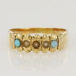 15ct yellow gold band ring set with three 2mm diameter seed pearls and two 2.5mm diameter