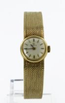 Ladies 9ct cased Omega manual wind wristwatch, circa 1967. The silvered dial with gilt baton markers