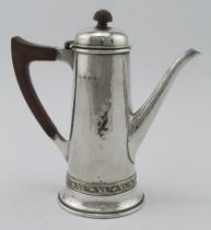 A.E. Jones Arts & Crafts silver coffee pot with stylised wooden handle, hallmarked AEJ Birm. 1924,