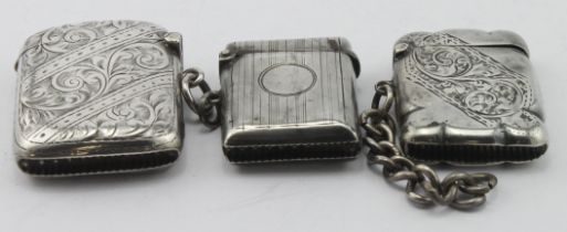 Three silver vesta cases hallmarked Birm. 1902, 1918 & 1921, total weight of items 1.75oz approx.