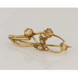 Yellow gold (tests 18ct) antique diamond and yellow topaz brooch, eight rose cut diamonds