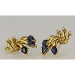 Tested as 18ct yellow gold sapphire and diamond earrings with post and butterfly fittings. Each