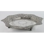 Large ornate Indonesian (prob.) 800 grade silver salver on four paw feet, marked on the back MK PB