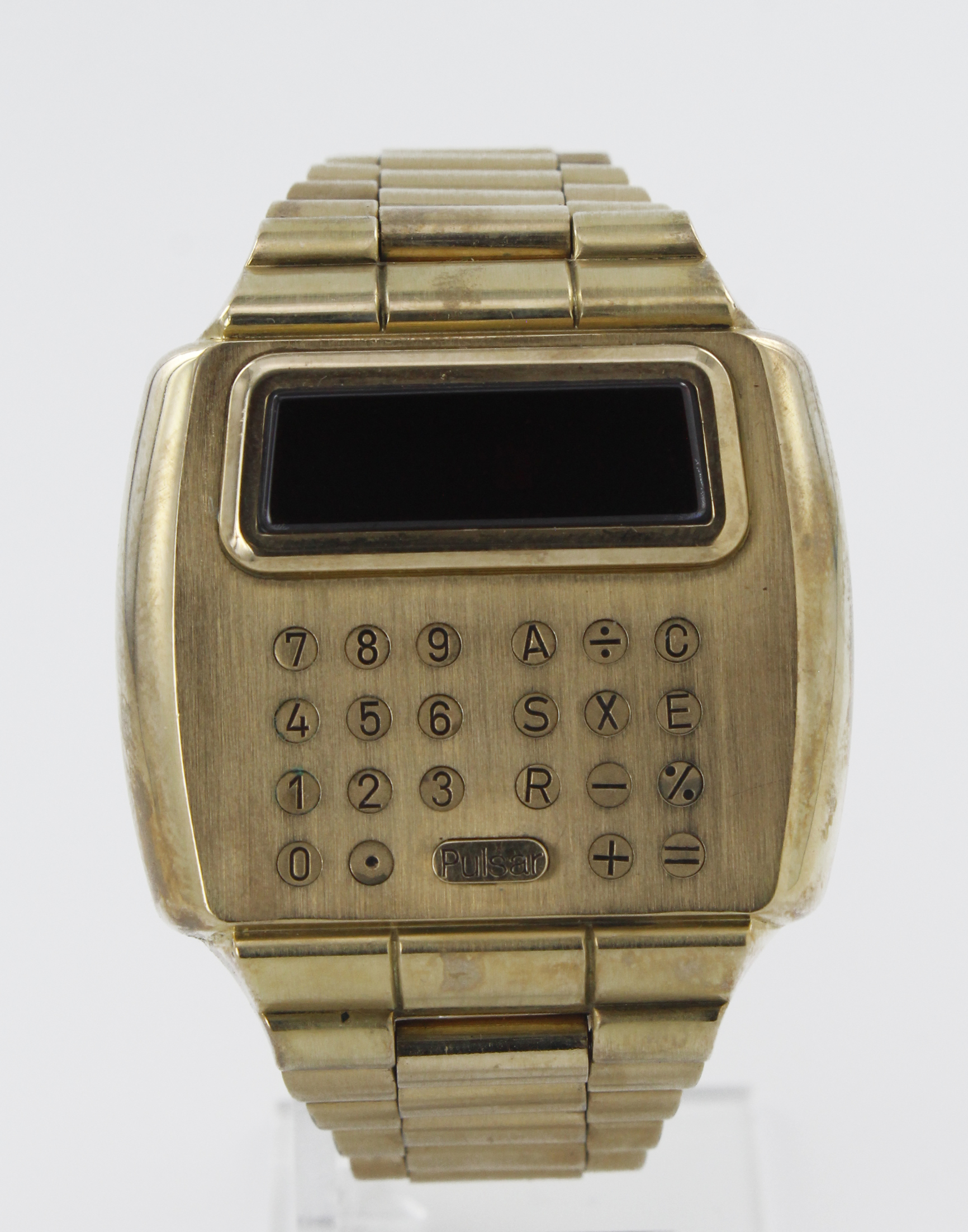 Gents 14k gold filled Pulsar Time Computer Calculator quartz wristwatch, circa 1970s. The gold