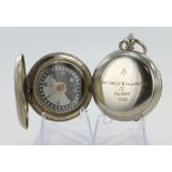 Two British Military Issue nickel cased compasses. One by Dennison dated 1916 with issue markings '↑