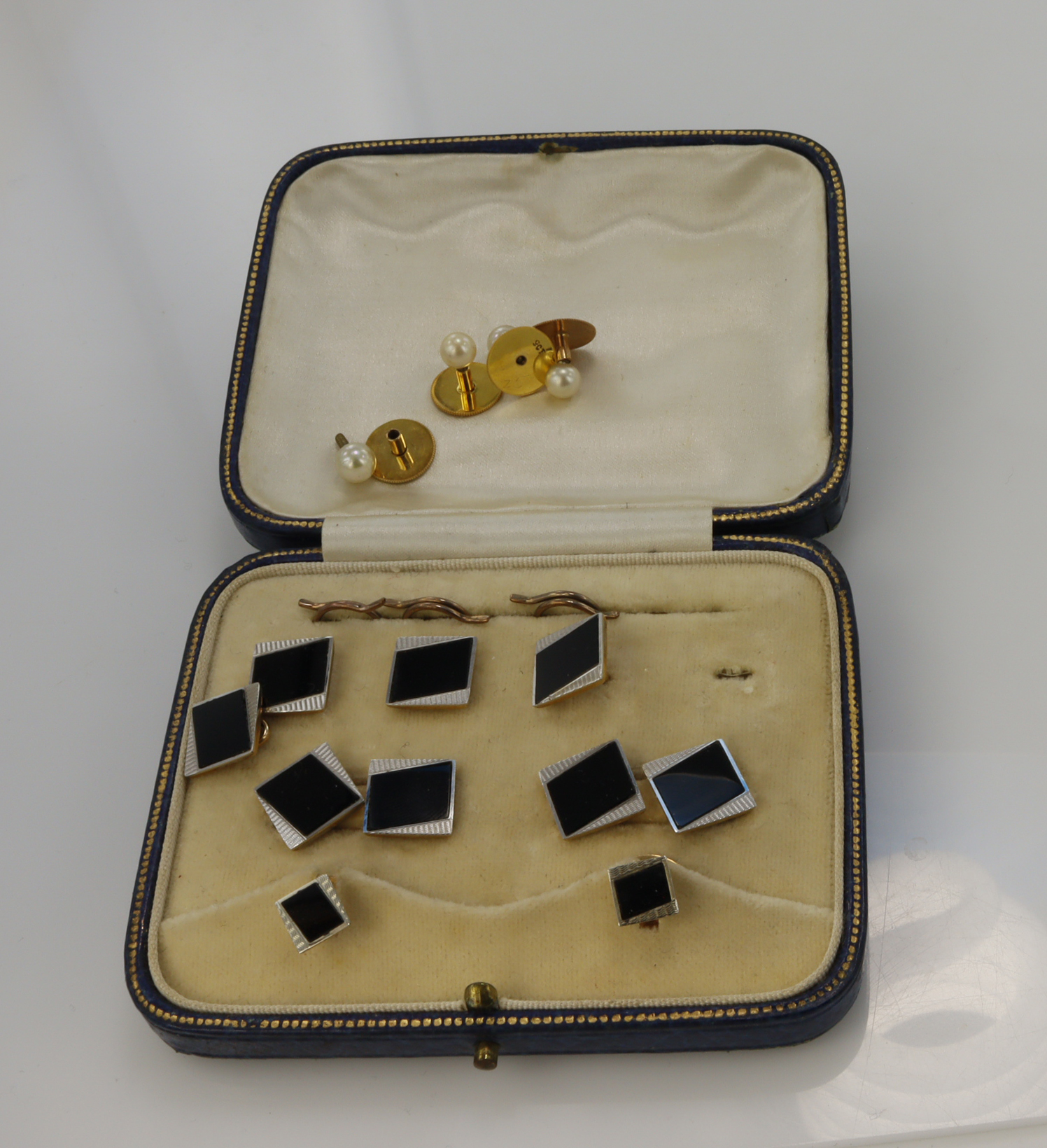 Assortment of yellow gold (tests 9ct) vintage dress stud sets, yellow and white gold onyx set