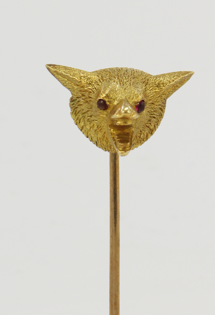 Yellow gold (tests 18ct) antique fox head tie pin, ruby set cabochon eyes, head width 10mm, yellow