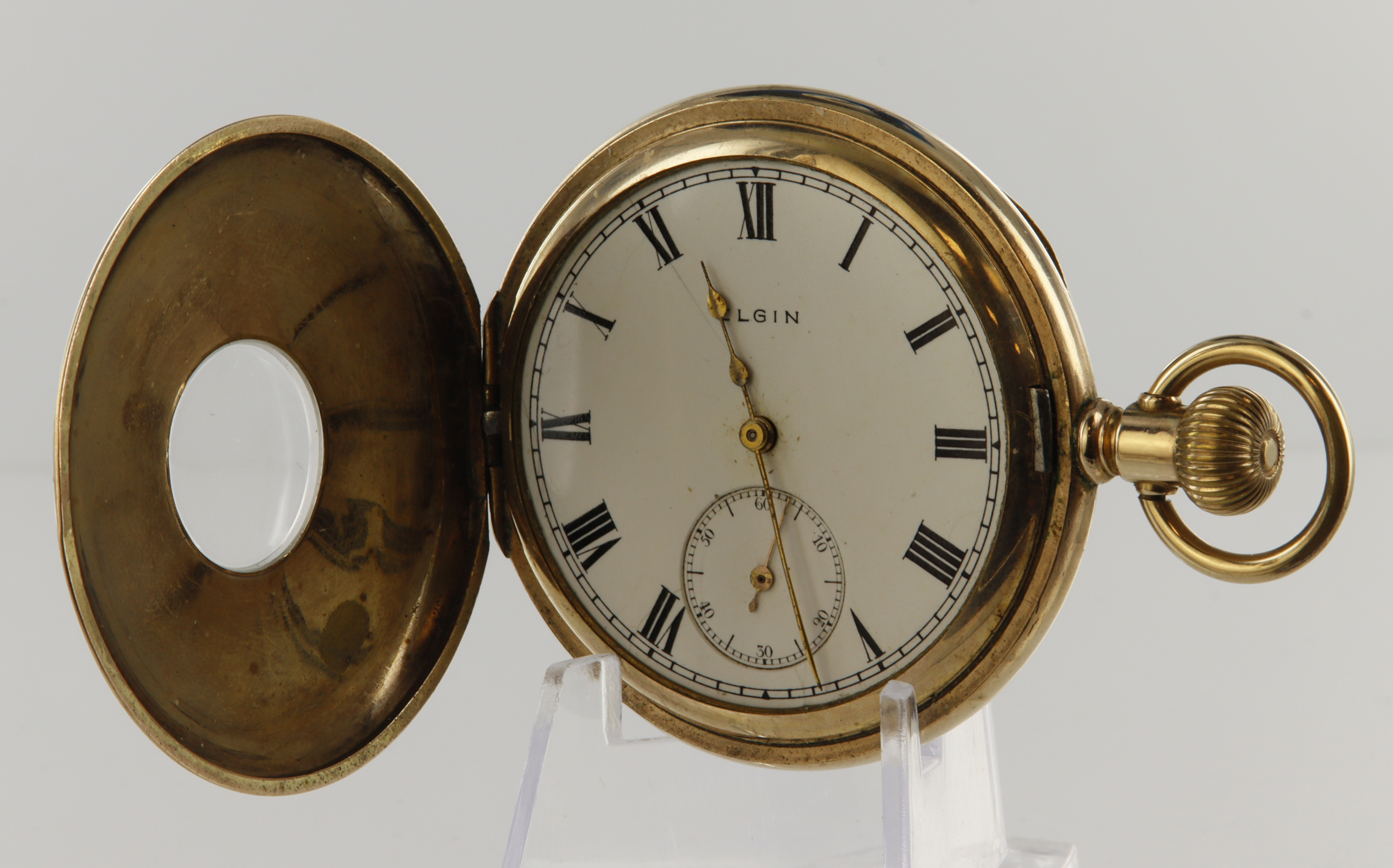 Gold plated half hunter pocket watch by Elgin, with Roman numerals and subsidiary dial, diameter