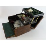 Leather Drew & Co. jewellery box containing a quanity of mixed custome jewellery. Silver and gold
