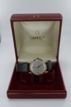 Gents 9ct cased Omega manual wind wristwatch, ref. 13337, circa 1947. The silvered dial with gilt