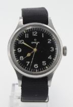 Omega British Military RAF Pilots wristwatch, circa 1956. The black dial with Arabic numerals. The