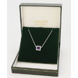 18ct white gold/tests 18ct amethyst pendant and chain, square amethyst measures approx. 6mm, heavy