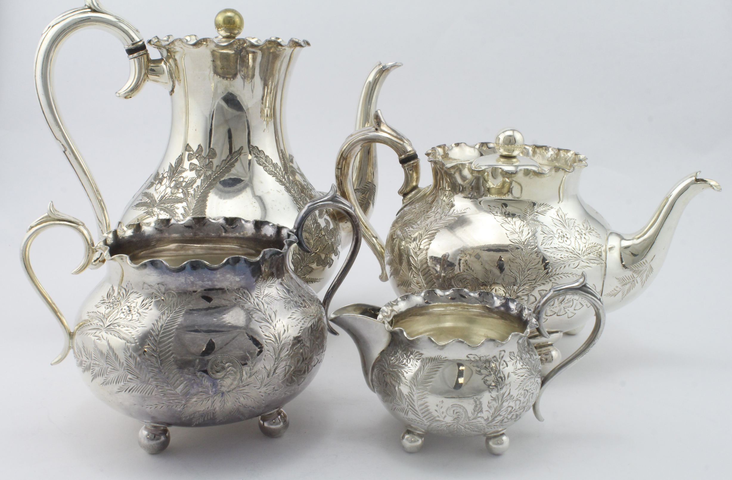 Four piece silver plated Victorian teaset comprising coffee pot, tea pot, sugar basin & cream jug by