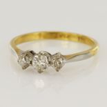 Yellow gold (tests 18ct) diamond trilogy ring, three graduating diamonds TDW approx. 0.32ct,