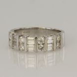 18ct white gold two row half eternity ring set with eight round brilliant cut diamonds and twelve