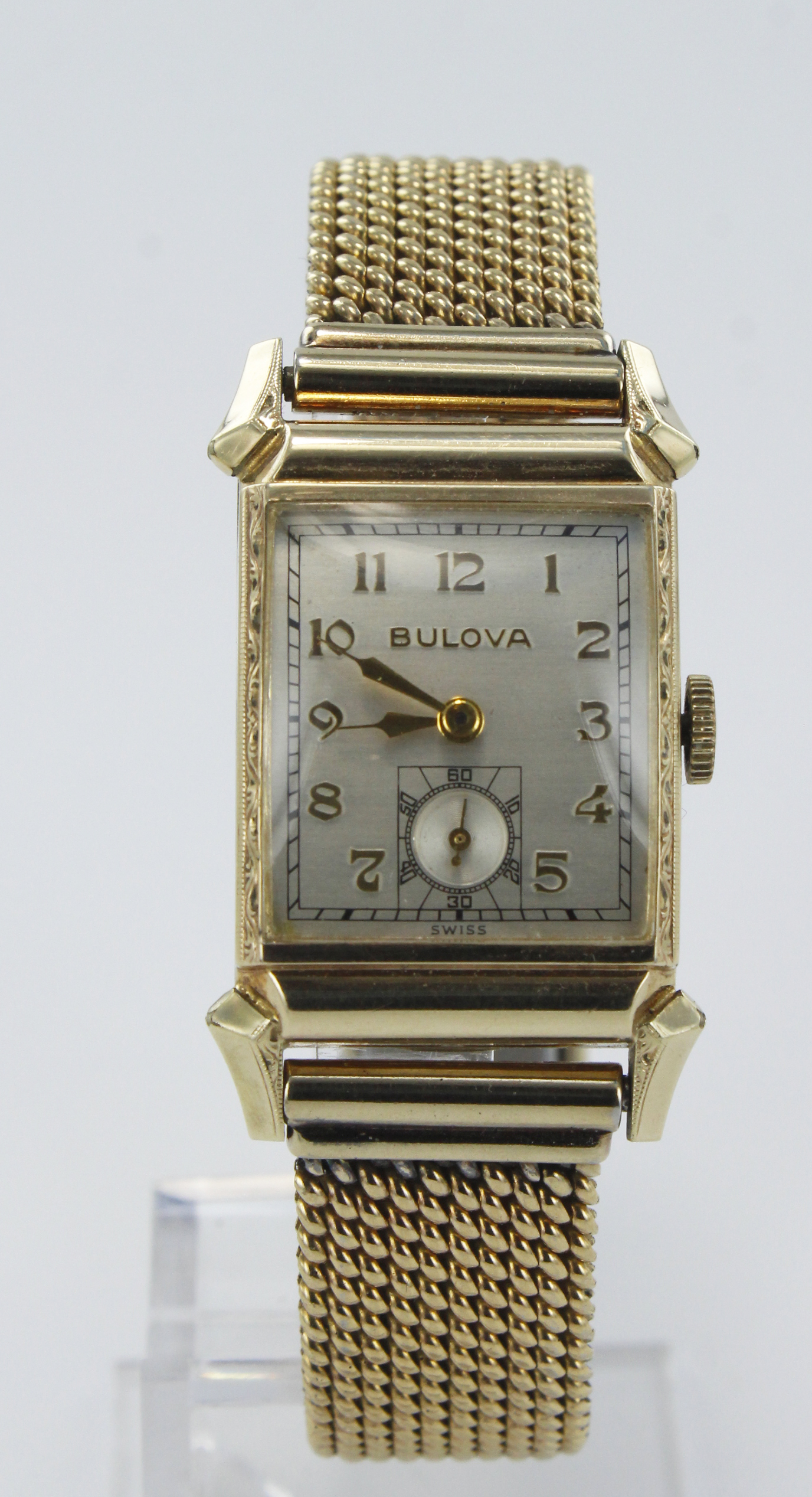 Gents gold plated and stainless steel cased Bulova manual wind wristwatch. The silvered dial with