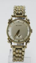 Gents gold plated Bulova manual wind wristwatch, circa 1952. The silvered Pipan dial with gilt