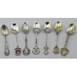 Seven silver Souvenir spoons, five bear British hallmarks and two bear marks for Sterling (