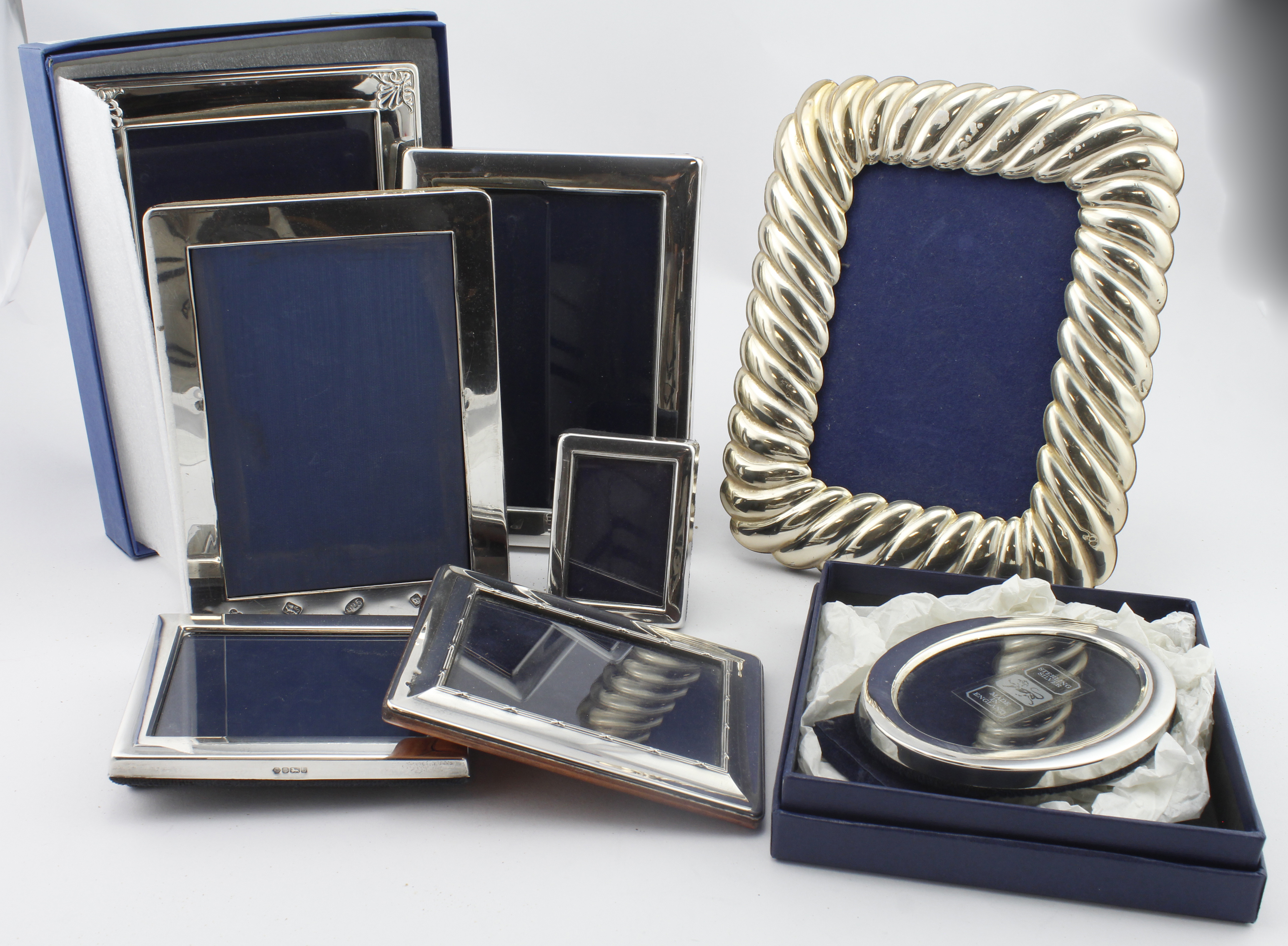 Mixed lot of modern silver mounted photo frames, various sizes, all bear modern British hallmarks (