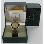 Gents stainless steel and gold plated Gucci quartz wristwatch, ref 9700M. Case size approx 36mm,