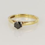 18ct yellow gold black diamond solitaire ring, one round diamond approx. 0.40ct, finger size P/Q,