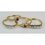 Four 18ct gold/tests 18ct gold rings, to include a antique ruby and seed pearl trilogy ring,