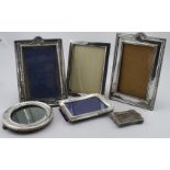 Six silver mounted photo frames, five bear older British hallmarks and one is marked "Sterling