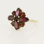 9ct yellow gold rhodolite garnet cluster ring, four round cuts and four marquise cuts, head measures