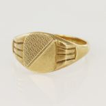 9ct yellow gold signet ring, cushion shaped table measures 12 x 10mm, finger size X, weight 4.7g.