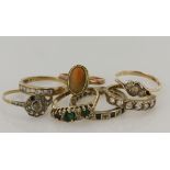 Seven 9ct gold/tests 9ct rings, stones include CZ, paste and shell, finger sizes Lx2, Nx2, O, P, all