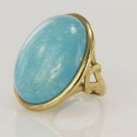 9ct yellow gold blue hard stone ring, stone measures 25 x 21mm, finger size L/M, weight 9.6g.