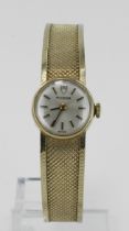 Ladies 9ct cased Tudor manual wind wristwatch, circa 1965. The silvered dial with baton markers