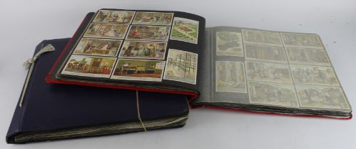 Collection of approx 133 complete sets of Liebig cards, contained in photo corners within 2 large