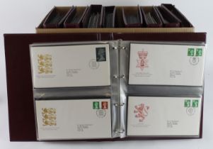GB FDC's in 9x matching Royal Mail FDC Albums. 1957 to c2004, includes booklet panes, definitives,
