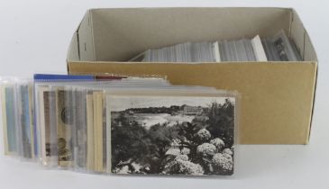 Shoebox of mixed old Foreign postcards in sleeves (100's)