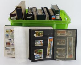 Crate with various albums x7 and stockbooks of varying sizes x4. Seven one country volumes incl