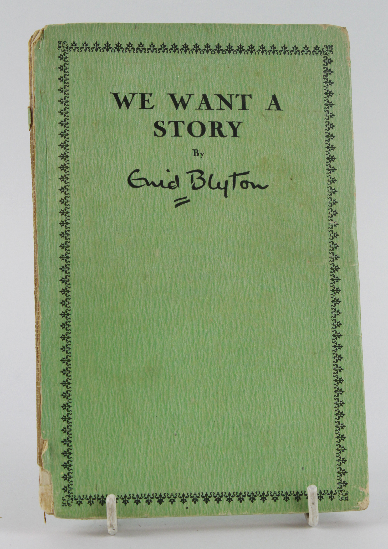 Blyton (Enid). Signed copy of We Want A Story, by Enid Blyton, circa 1940s, signed 'Love from Enid