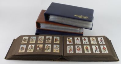 Collection of 3 modern albums & 1 vintage album, sets & cards from Churchman & Players, mixed