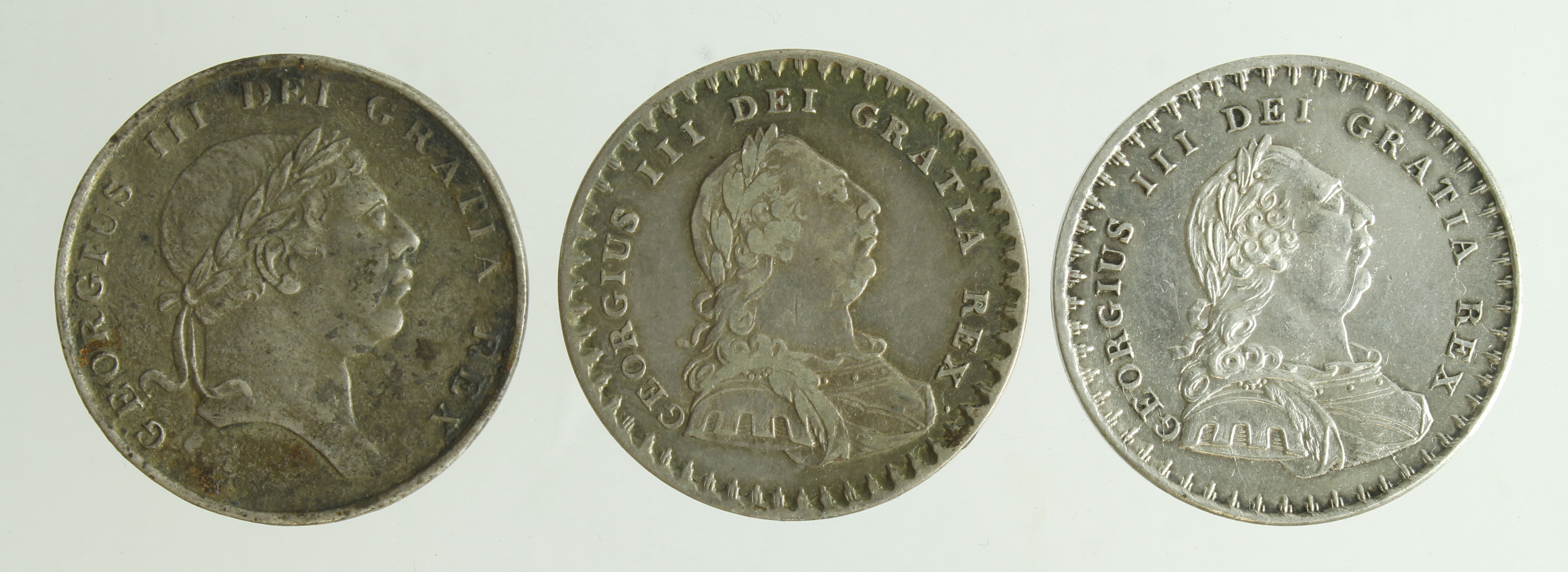 Eighteenpence silver bank tokens (3): 1811 nVF, 1812 small head aEF light scratches, and 1813 Fine.