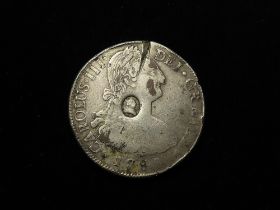 Dollar, contemporary forgery George III oval countermark on a supposed Mexico 8 Reales 1788 Mo FM.
