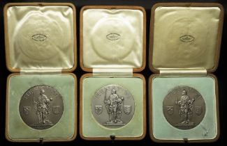 British School Medals (3) unmarked silver d.63mm, each 120-126g: Three rare and impressive Eton