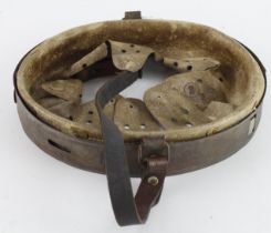 German WW2 Helmet liner and chin strap measures 26 inches around band stamped 58.